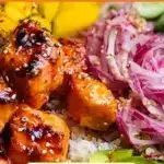 Hot honey salmon bowls with vibrant mango salad.