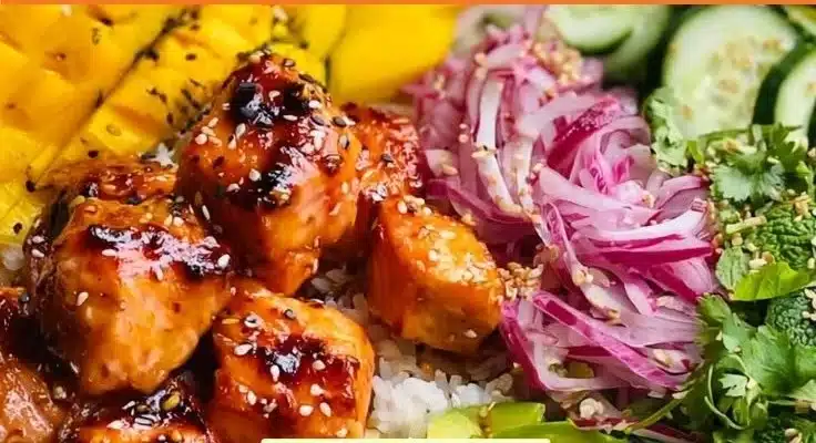 Hot honey salmon bowls with vibrant mango salad.